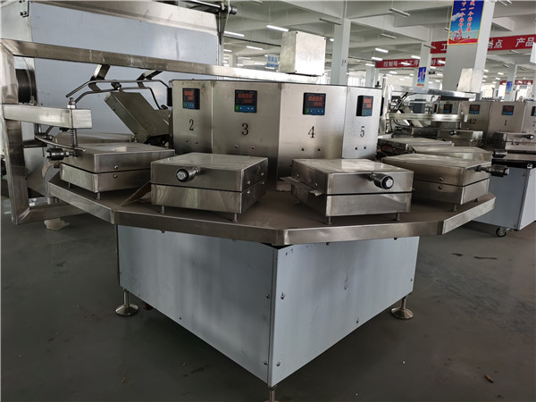 食品油炸機廠家簡述怎樣控制油炸機的油溫和火候